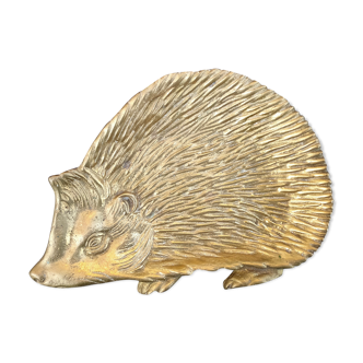 Empty brass hedgehog pocket