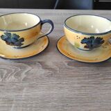 2 hand painted cups and saucers