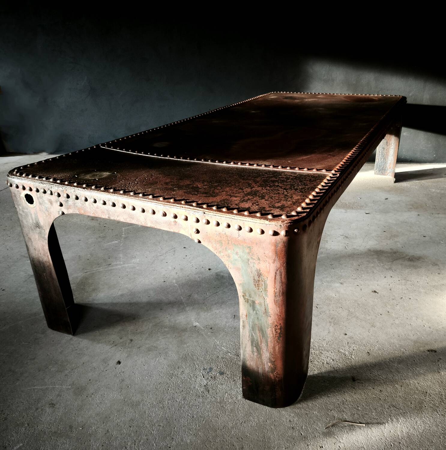 Riveted industrial table