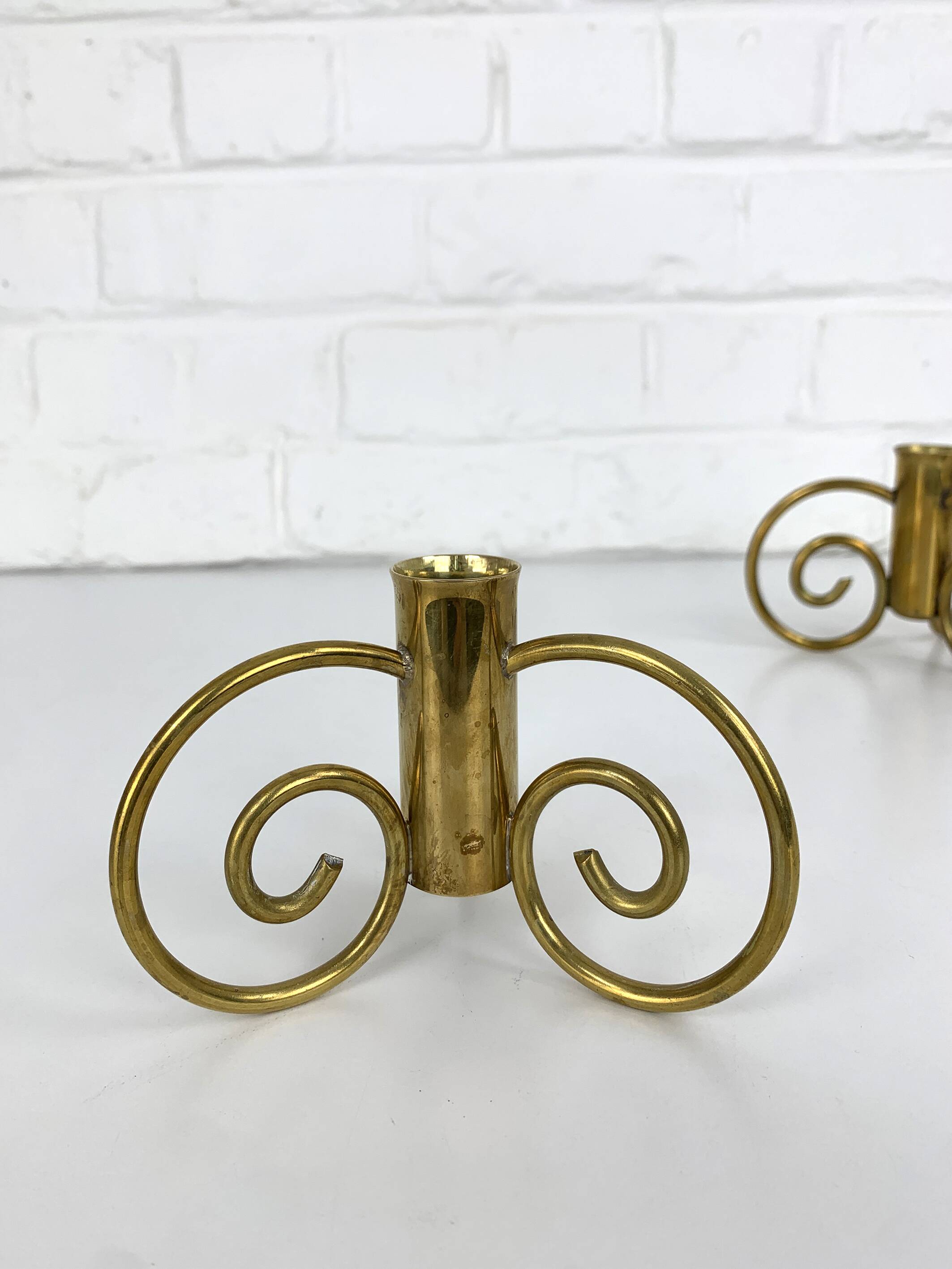 Pair of brass candlesticks, Lars Holmström for Svenskt Tenn, Sweden, 1950