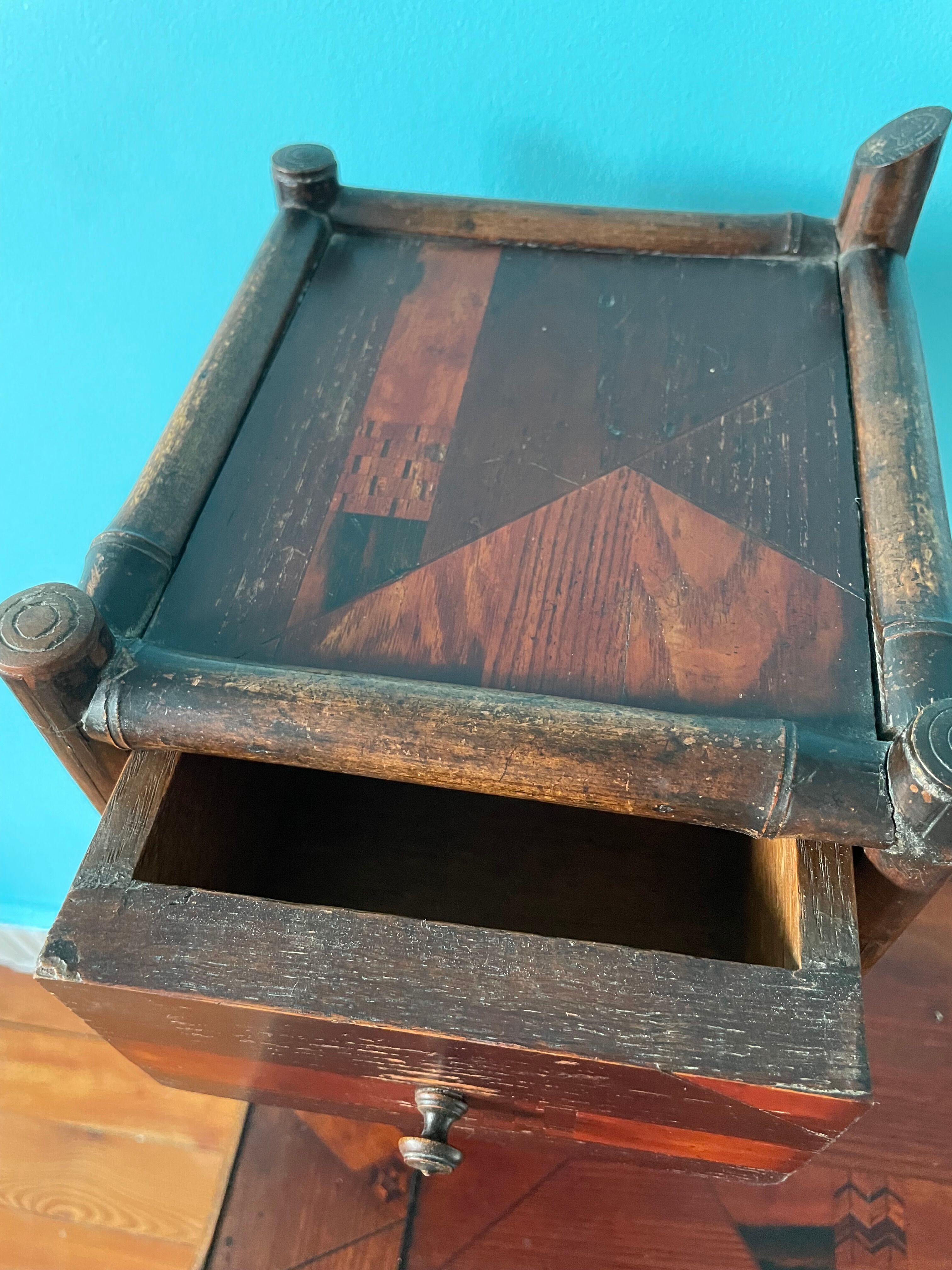Old secretary in marquetry and bamboo