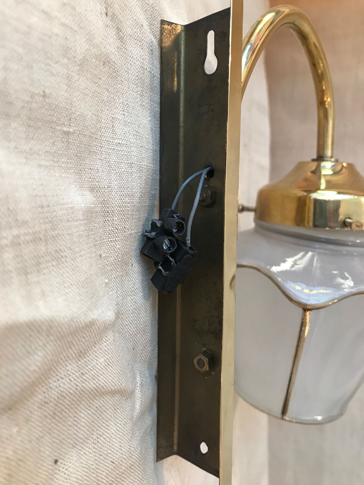 Pair of 1960 brass wall lamps and gilded frosted glass