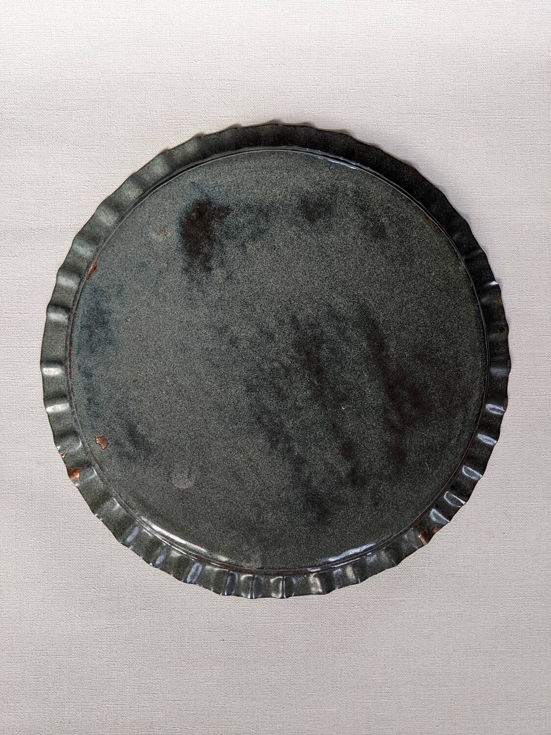 Extra-large enameled copper tray or catchall with ethnic tribal decoration.