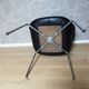 Armchair with leather and chrome armrests