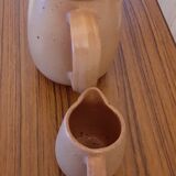 Coffee maker milk jar in sandstone