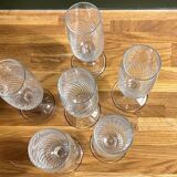 6 clear glass champagne flutes in very good condition