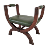 Green curule armchair