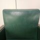 Pair of Art Decò armchairs in walnut and green leather, 1940