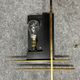 Wall lamp in black wood, gilded brass and opaline