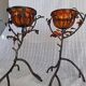 Pair of Art Deco style candle holders in wrought iron and amber blown glass.