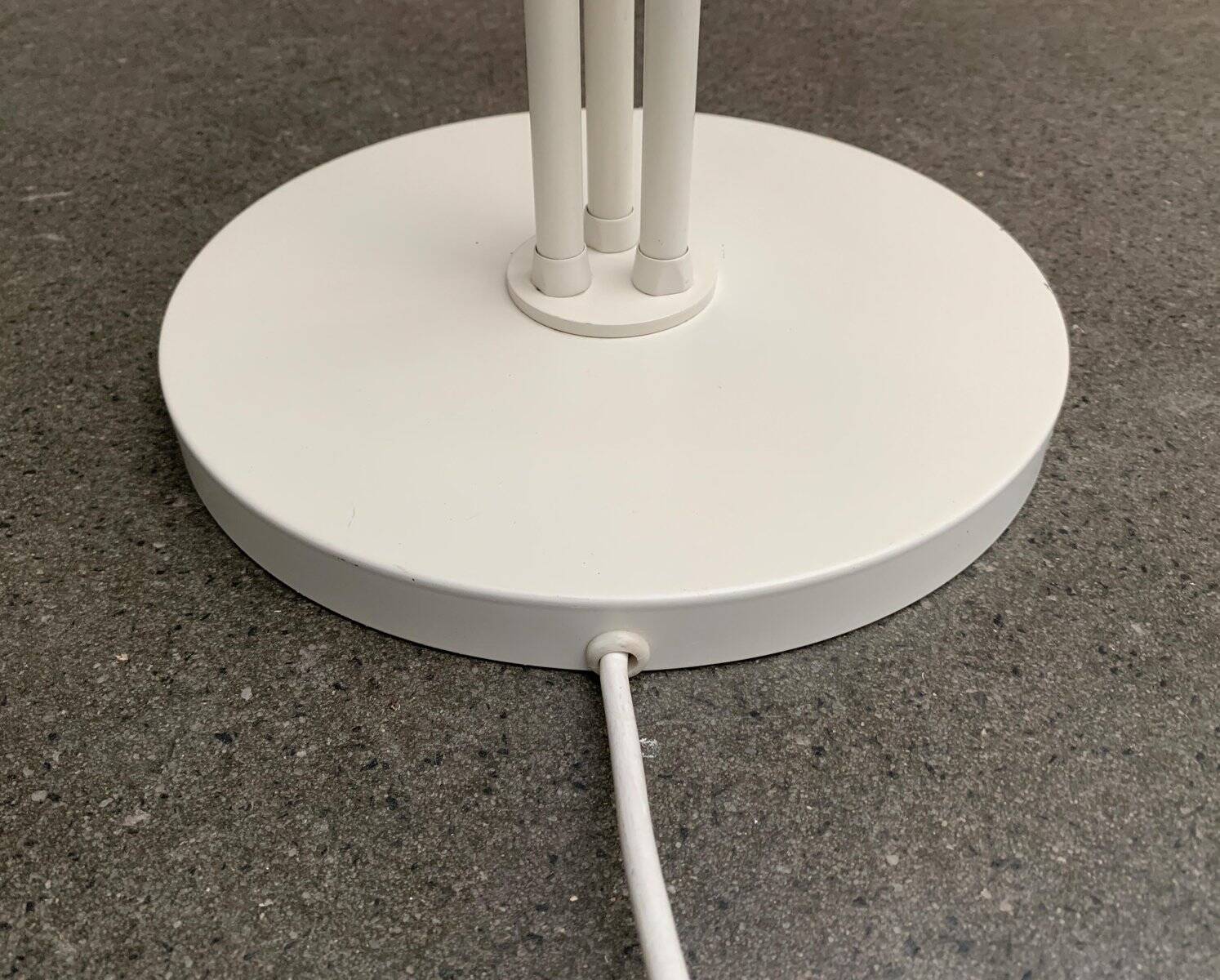 Minimalist German floor lamp from the space age by Cosack.