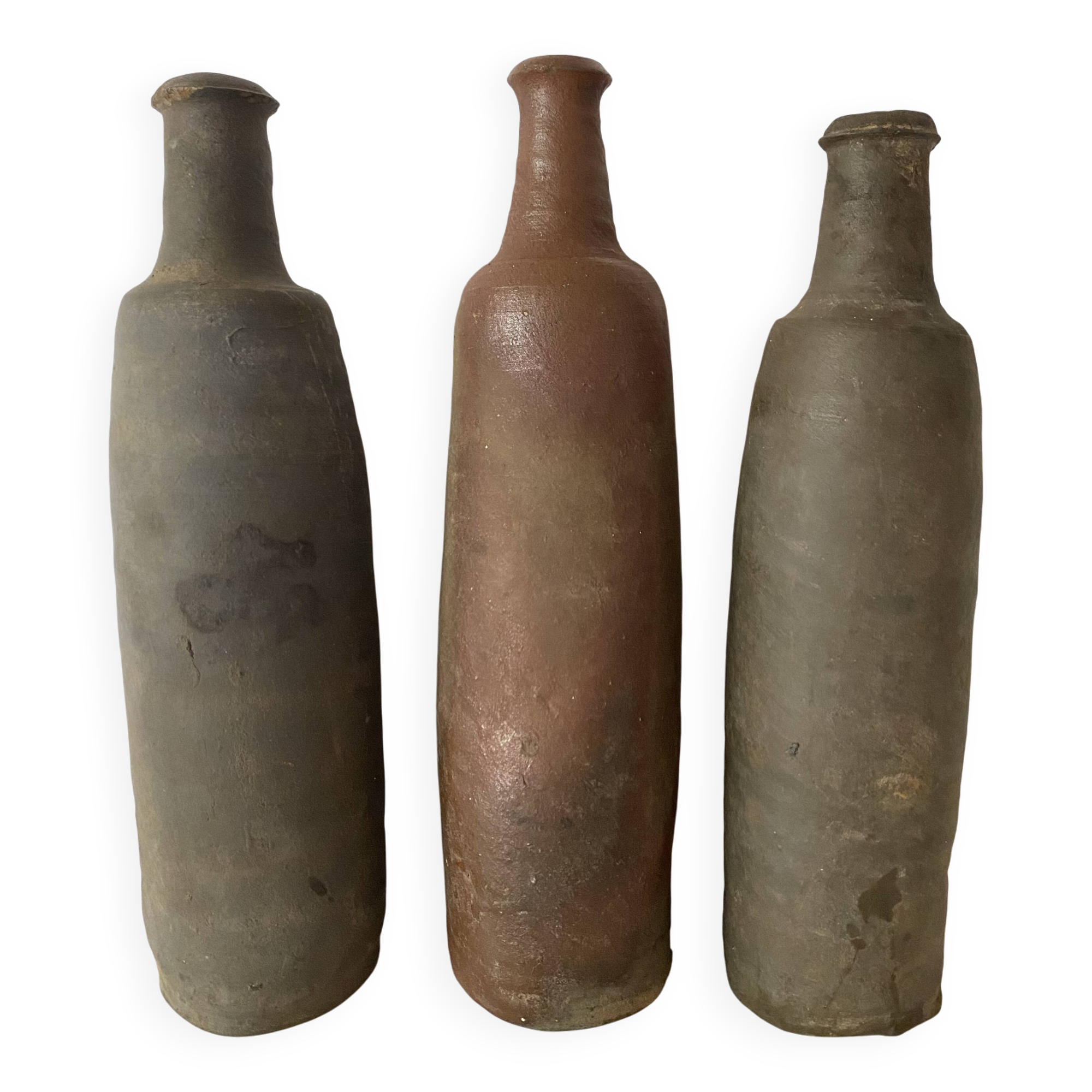Antique terracotta cider bottles