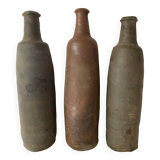 Antique terracotta cider bottles