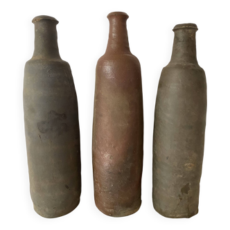 Antique terracotta cider bottles