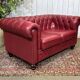Chesterfield 2-seater leather sofa, modern production from the 2000s.