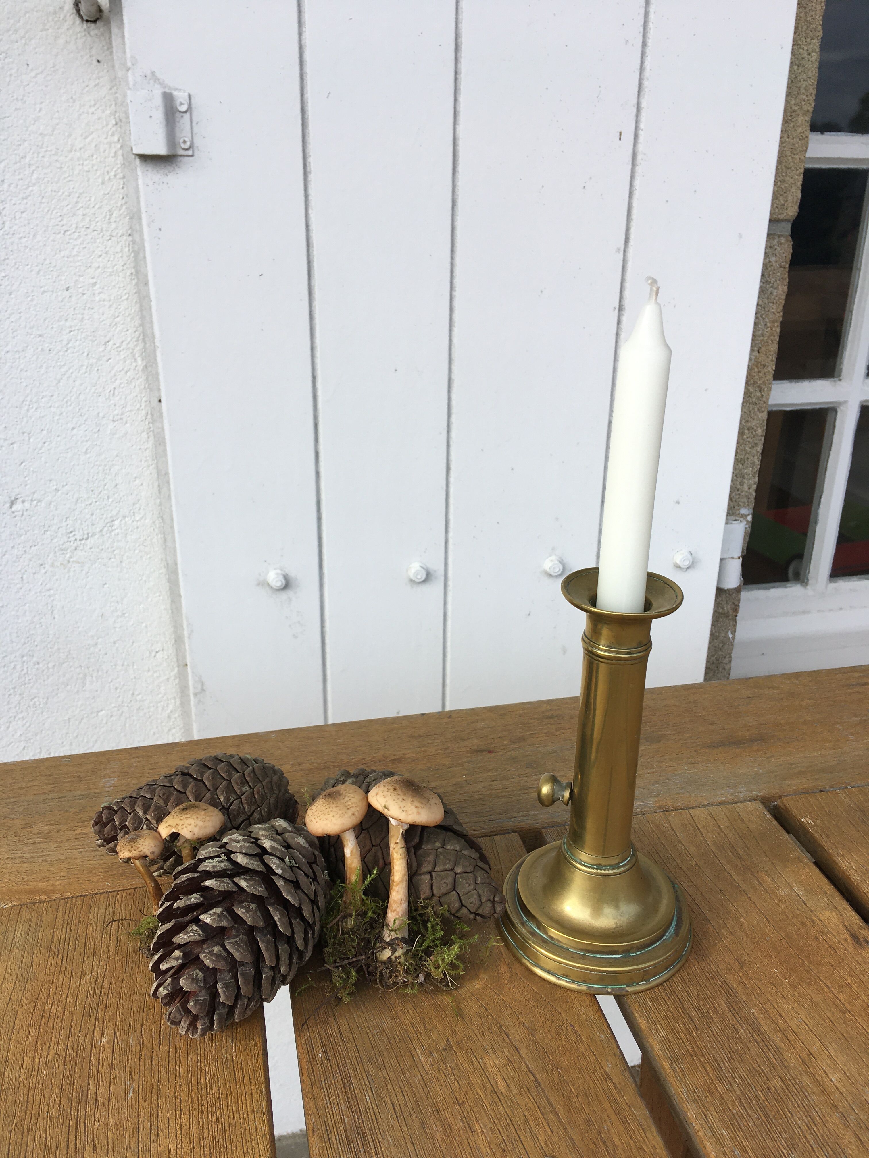 Brass pusher candle holder