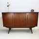 Vintage Danish teak wall unit with sliding doors from the 1960s.