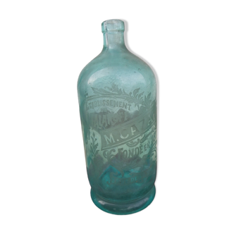 Blue green glass bottle engraved cazard paris founded in 1872 before 1900