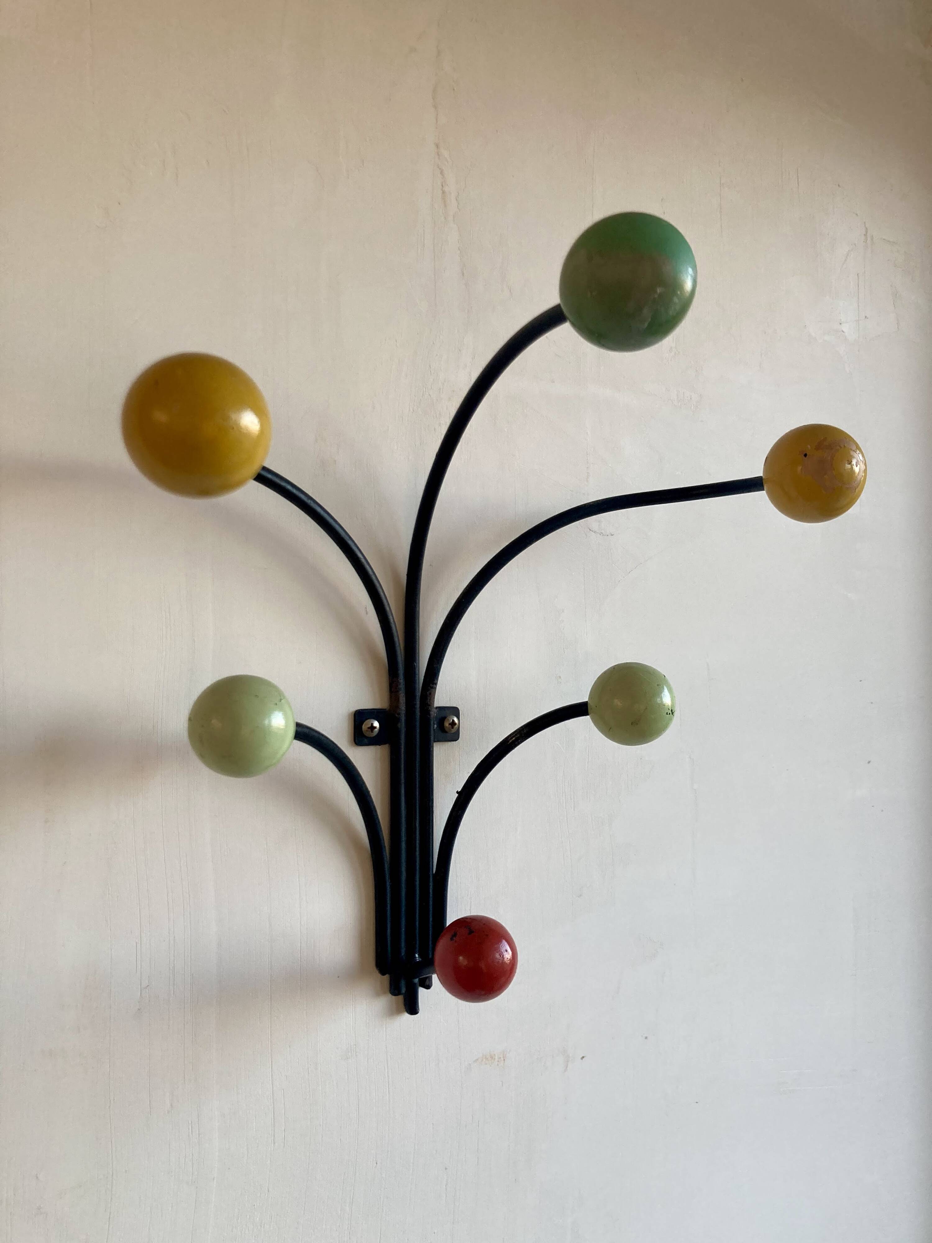 Wall mounted coat rack