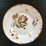 Old plate with floral decoration
