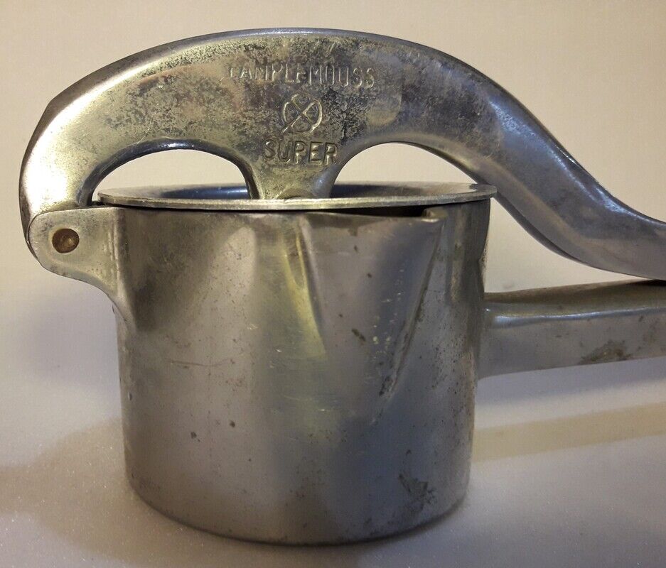 Vintage grapefruit metal citrus press