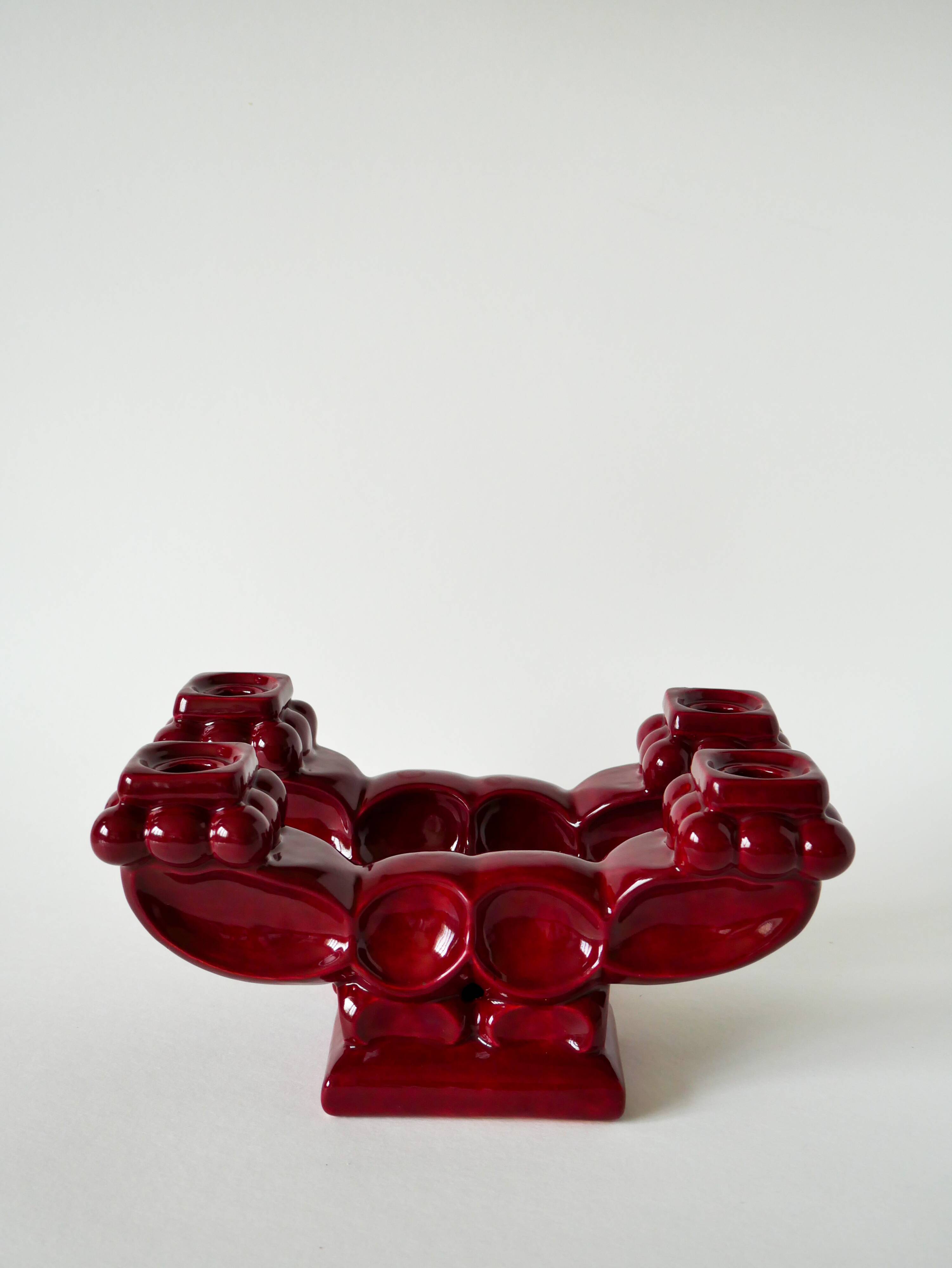 Pair of large burgundy ceramic candlesticks, 1950