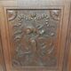 Paire d'anciennes portes en bois chêne sculpté