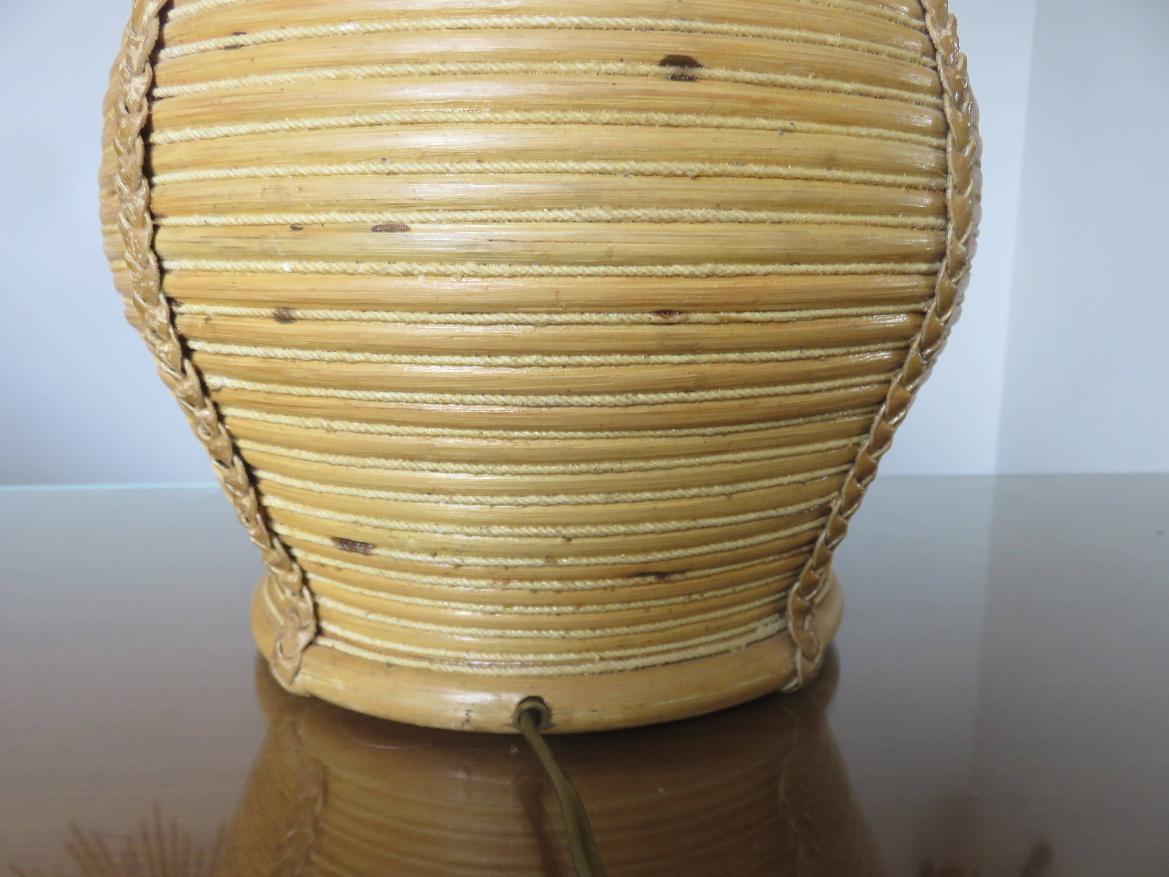Rattan, leather, rope, and wood lamp in the style of Gabriella Crespi 60-70.