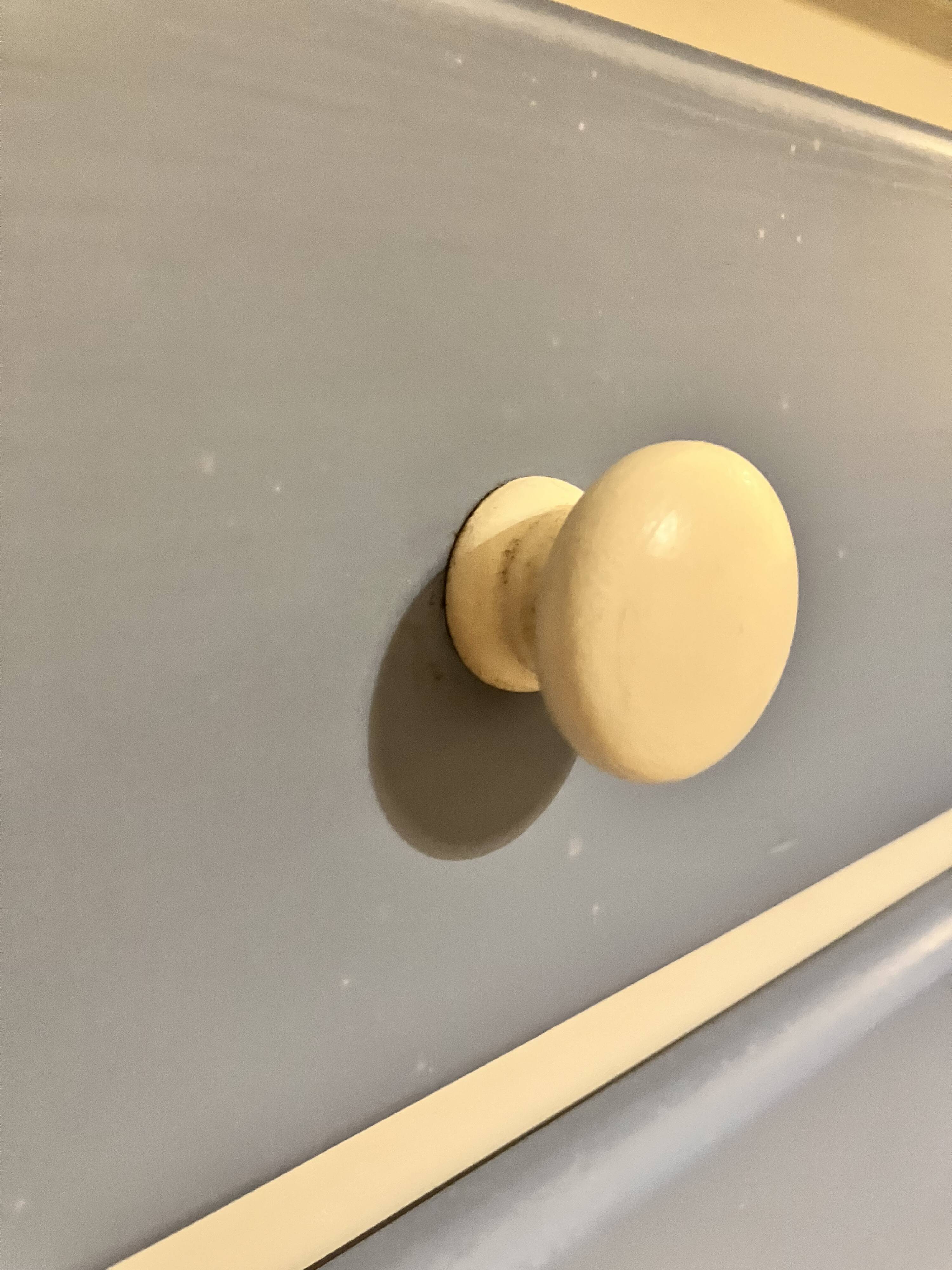 Wooden chest of drawers with tapered legs