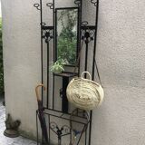 Wrought iron coat holder with 1930