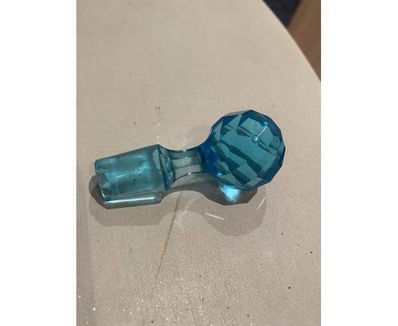 Blue carafe with vintage button