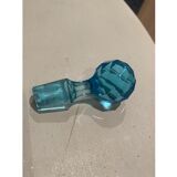 Blue carafe with vintage button