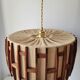 Suspension scandinave en bois et toile de jute
