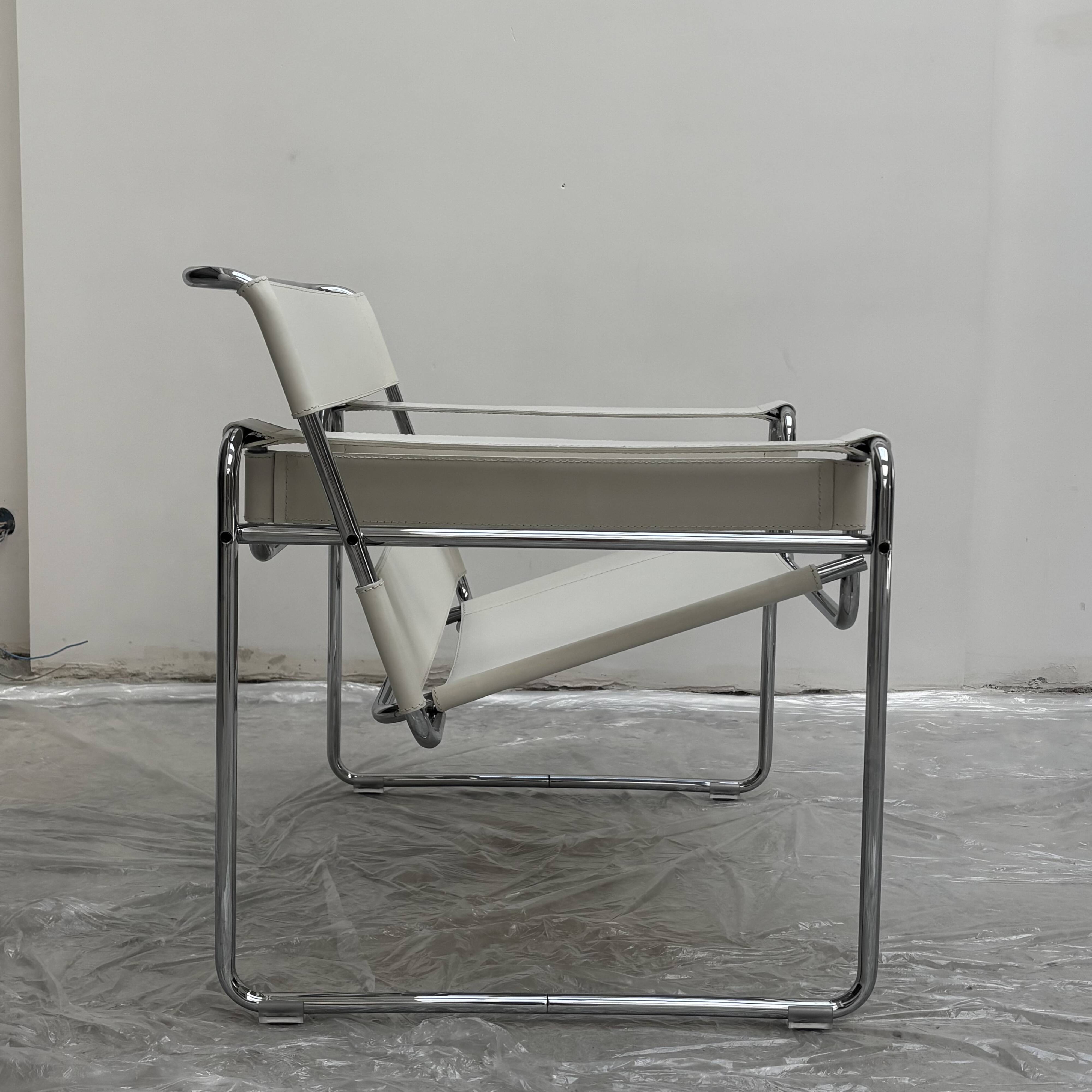 "Wassily" armchair by Marcel Breuer for Gavina in white leather.