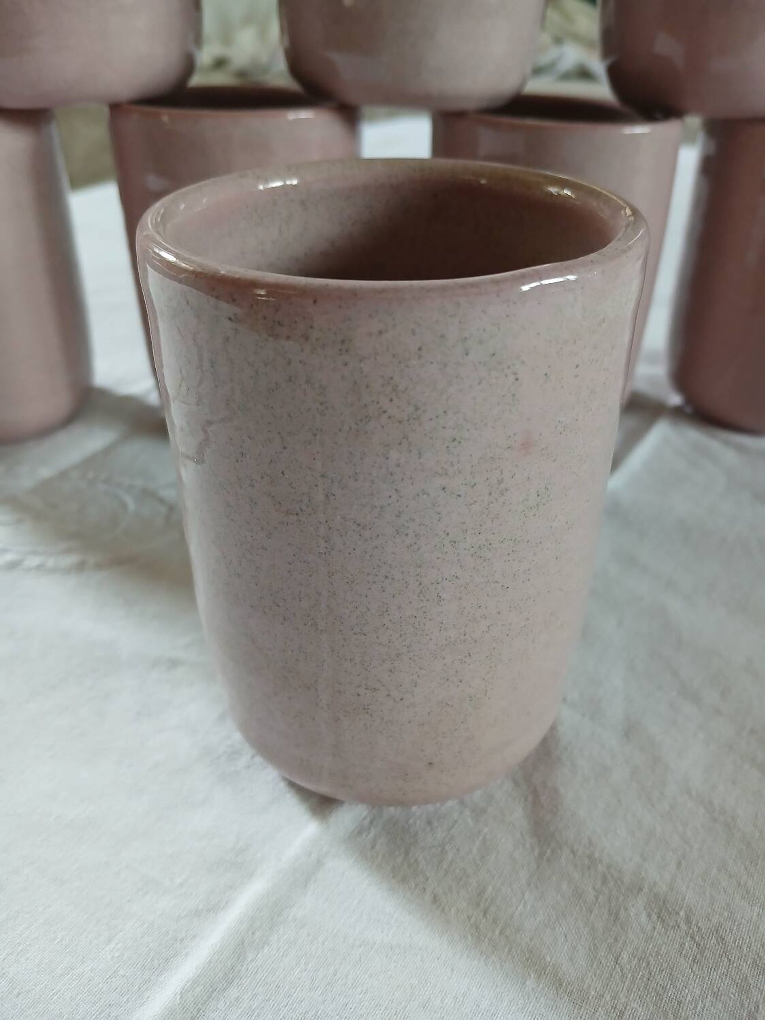 8 signed enamelled ceramic mugs