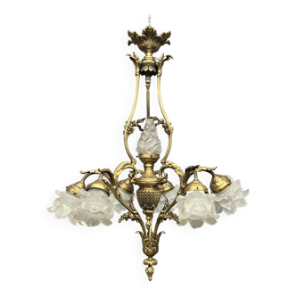 Antique chandelier in solid gilded bronze.