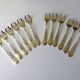 12 silver-plated oyster forks