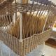 Rattan and wrought iron cradle