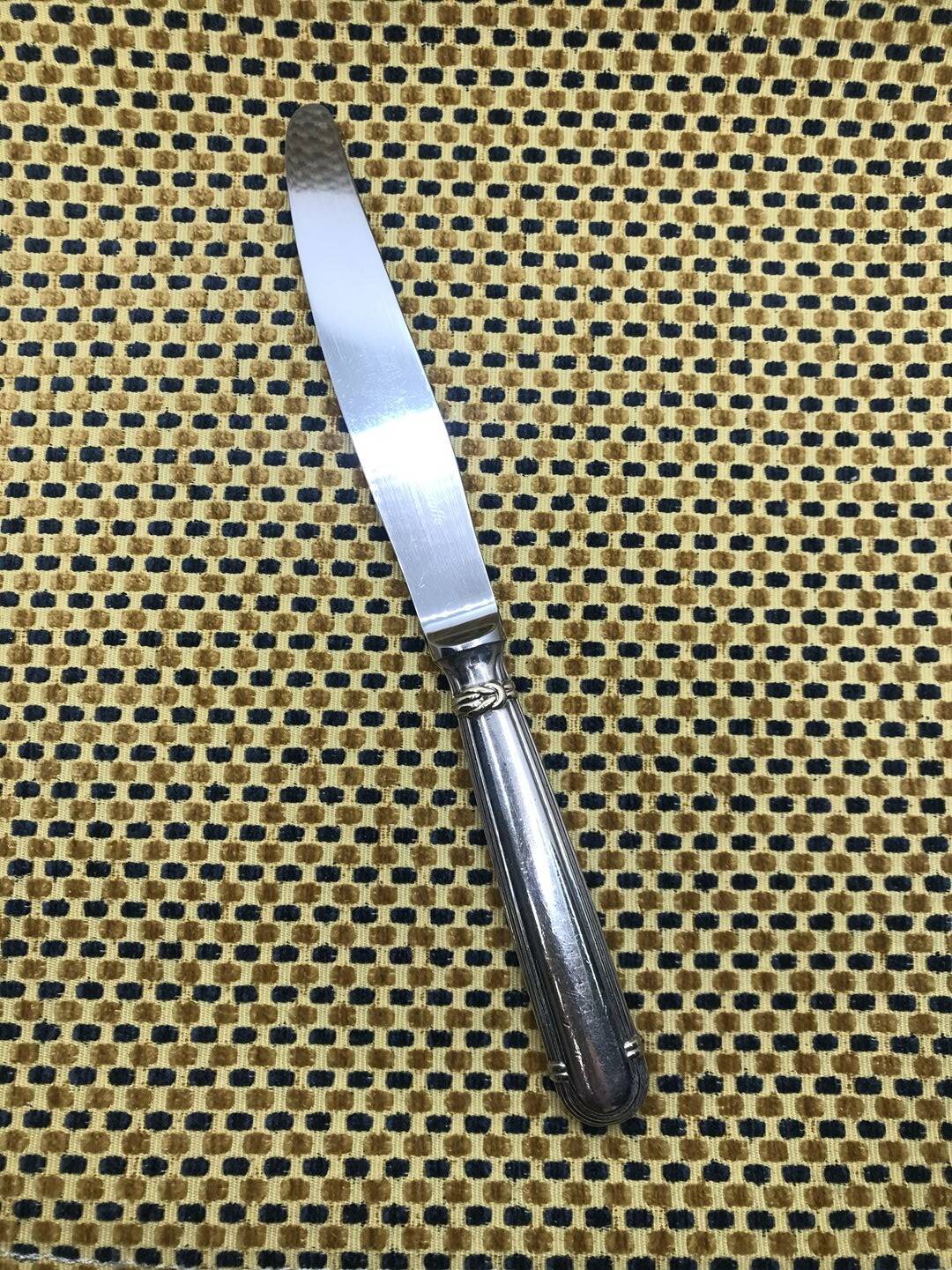 Christofle silver-plated knife, Océana model - gold rings
