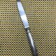 Christofle silver-plated knife, Océana model - gold rings
