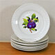 Eight antique dessert plates with multi-fruit patterns