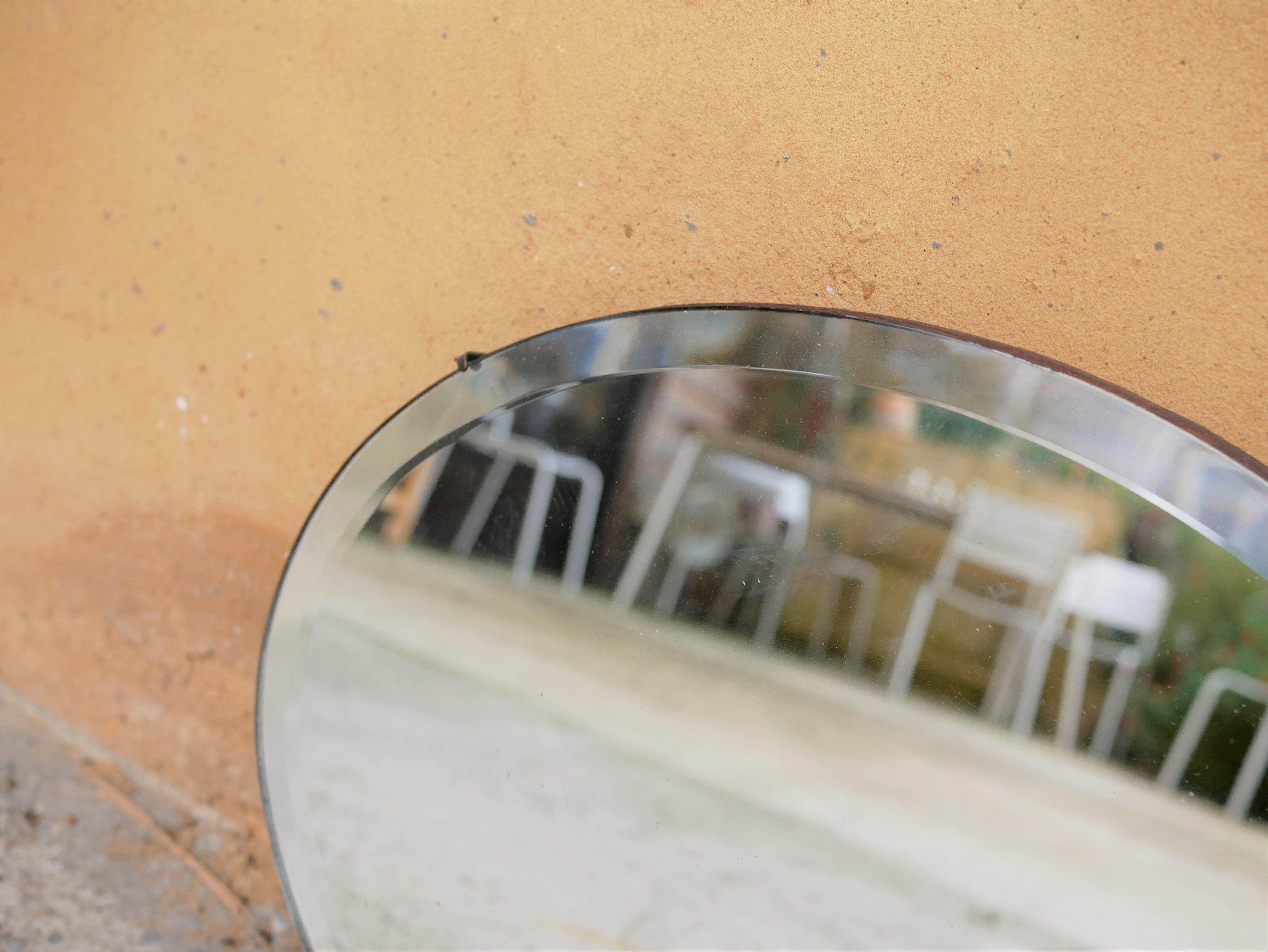 Vintage art deco bevelled oval mirror
