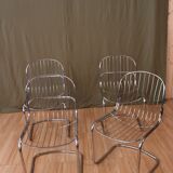 Series of 4 tubular steel chairs