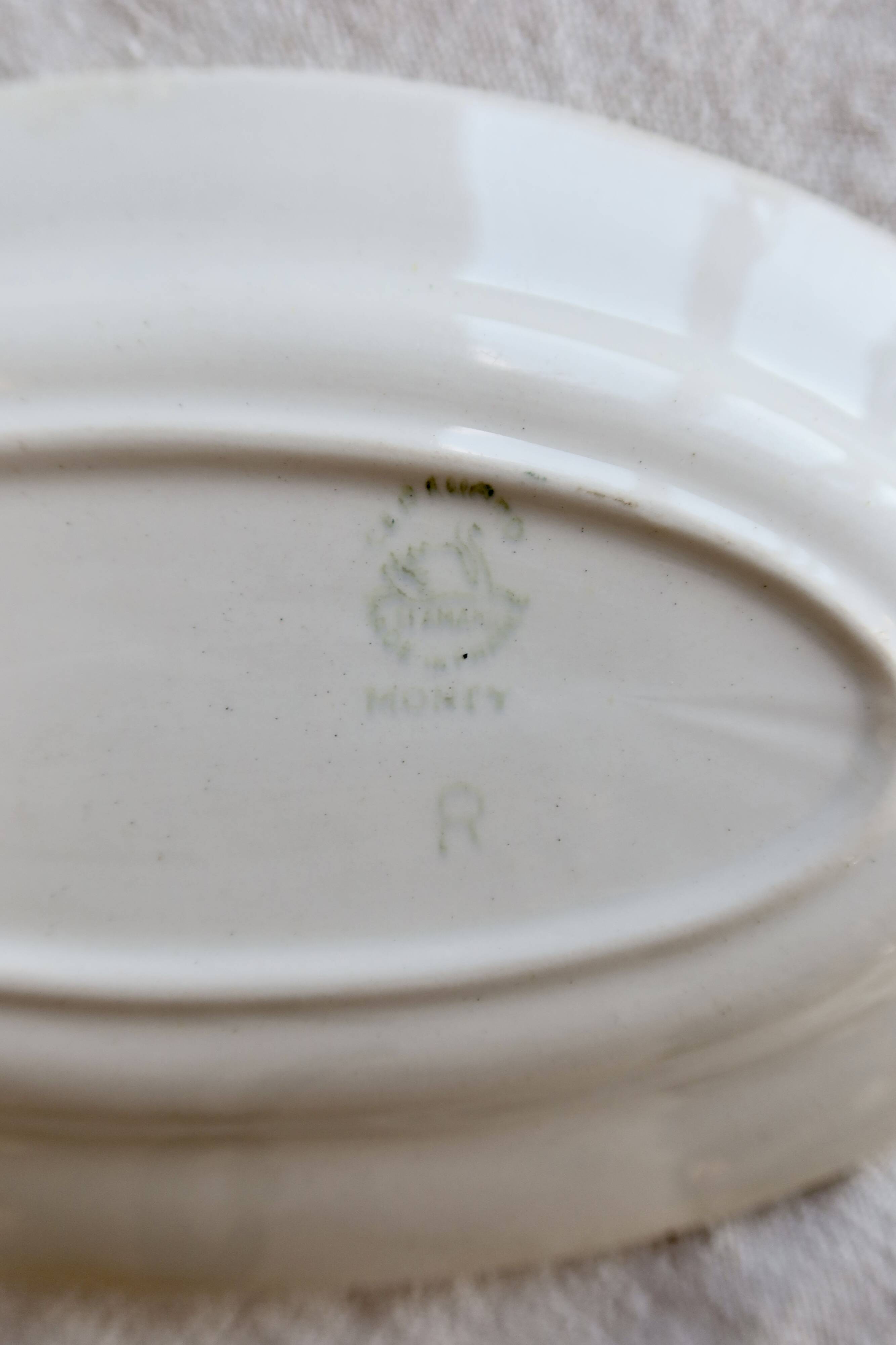 Old Ravier Céranord model Monty – Earthenware with geometric burgundy decoration