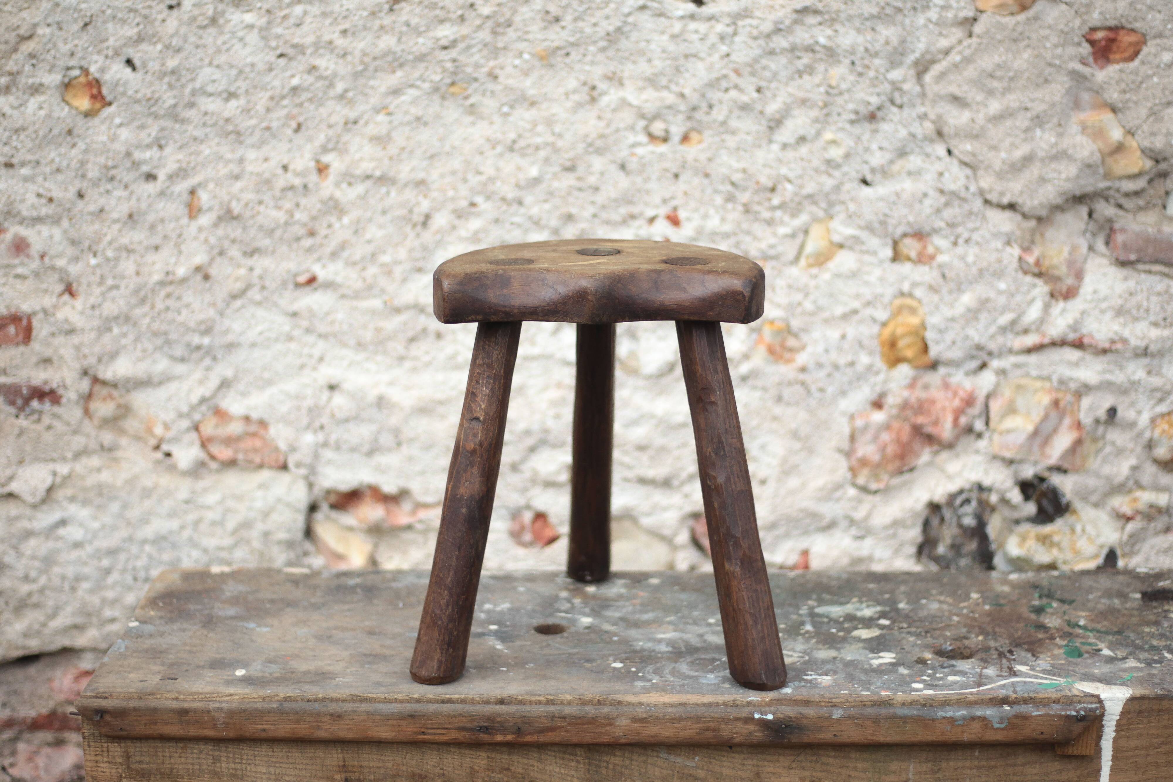 Vintage wooden tripod stool, mountain work, wabi-sabi, shepherd.