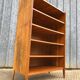 Vintage oak bookcase with compass base