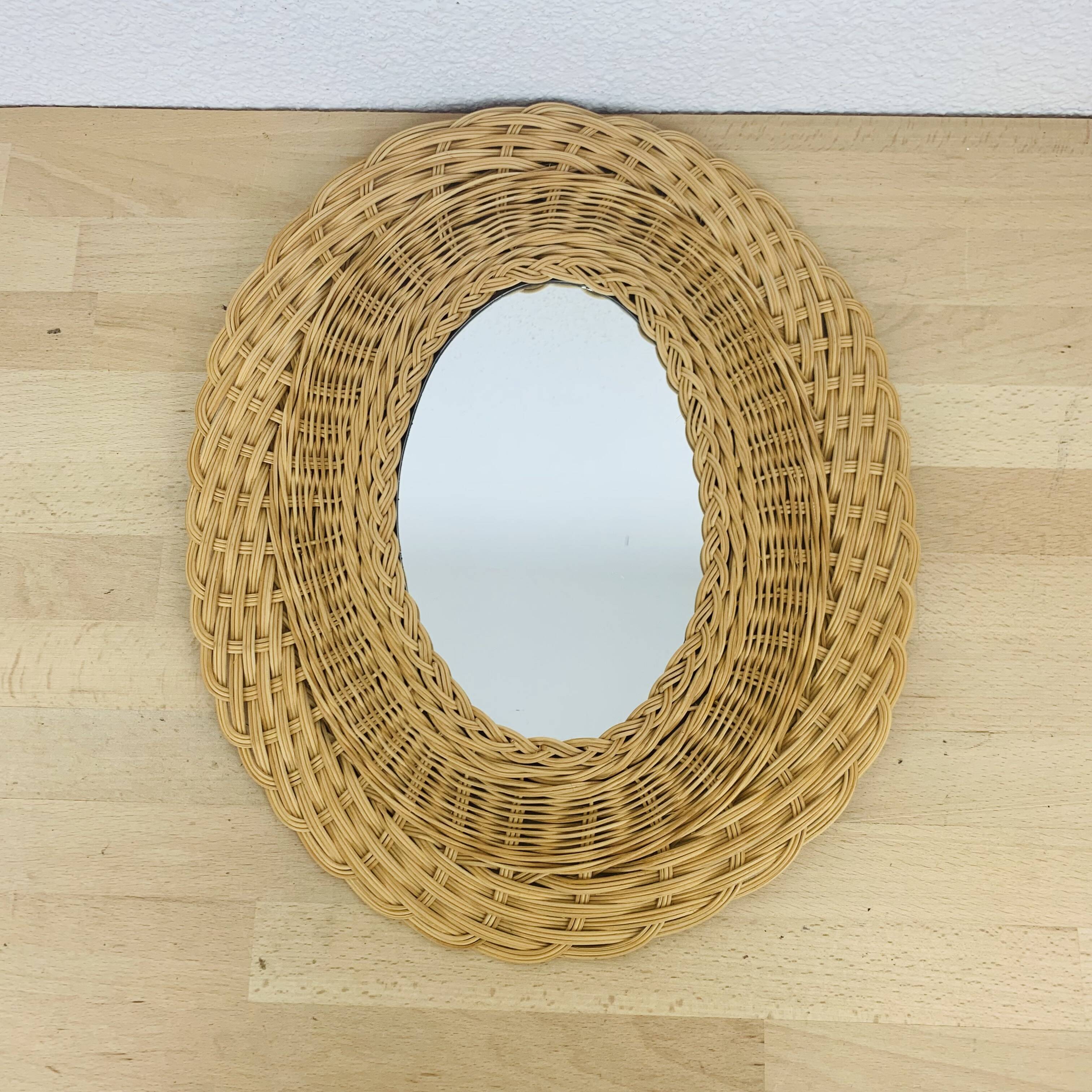 Vintage oval rattan mirror