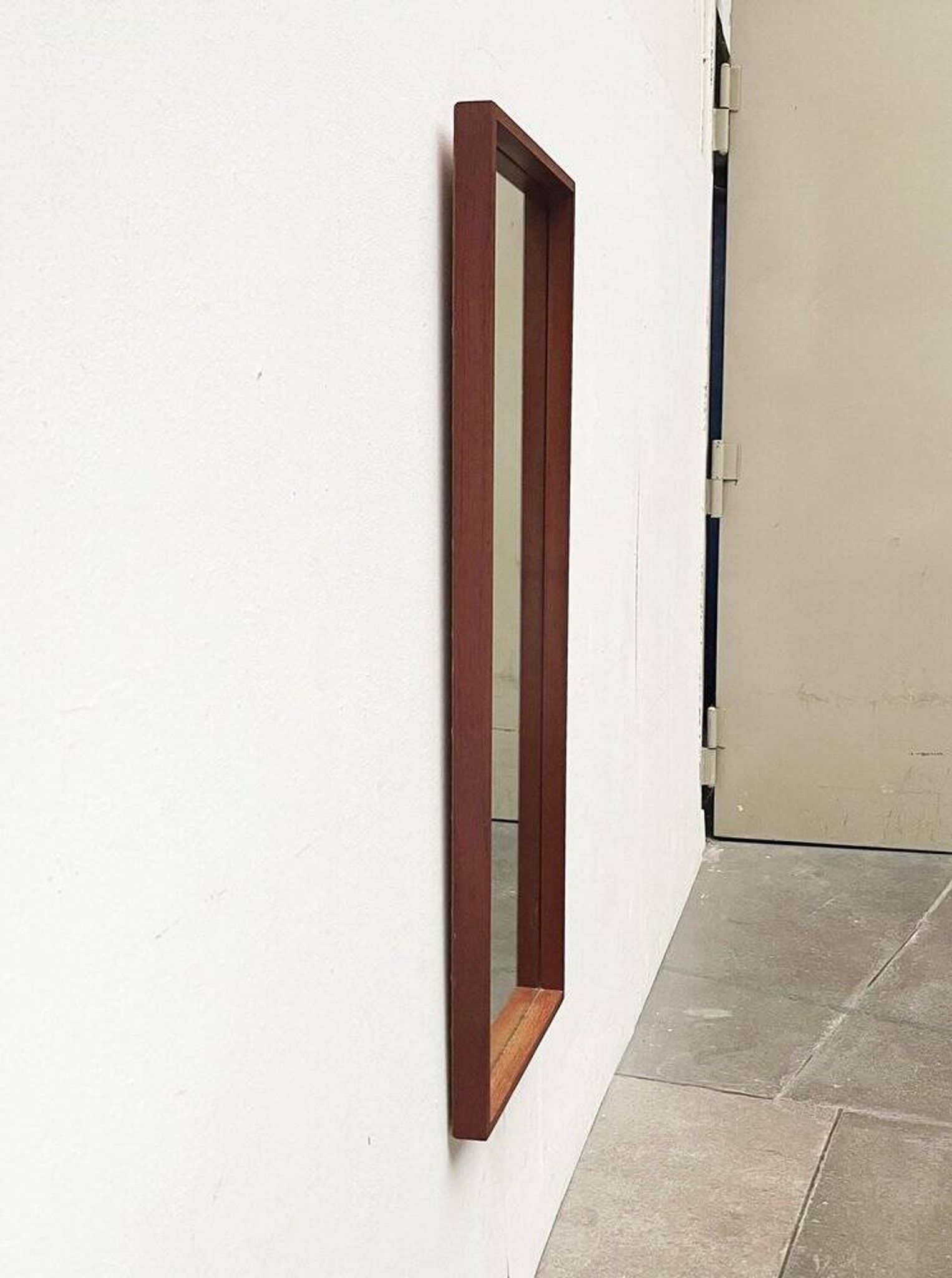 Minimalist mid-century German mirror in teak by Zier-Form, 1960s.