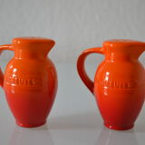 Le Creuset orange advertising salt and pepper
