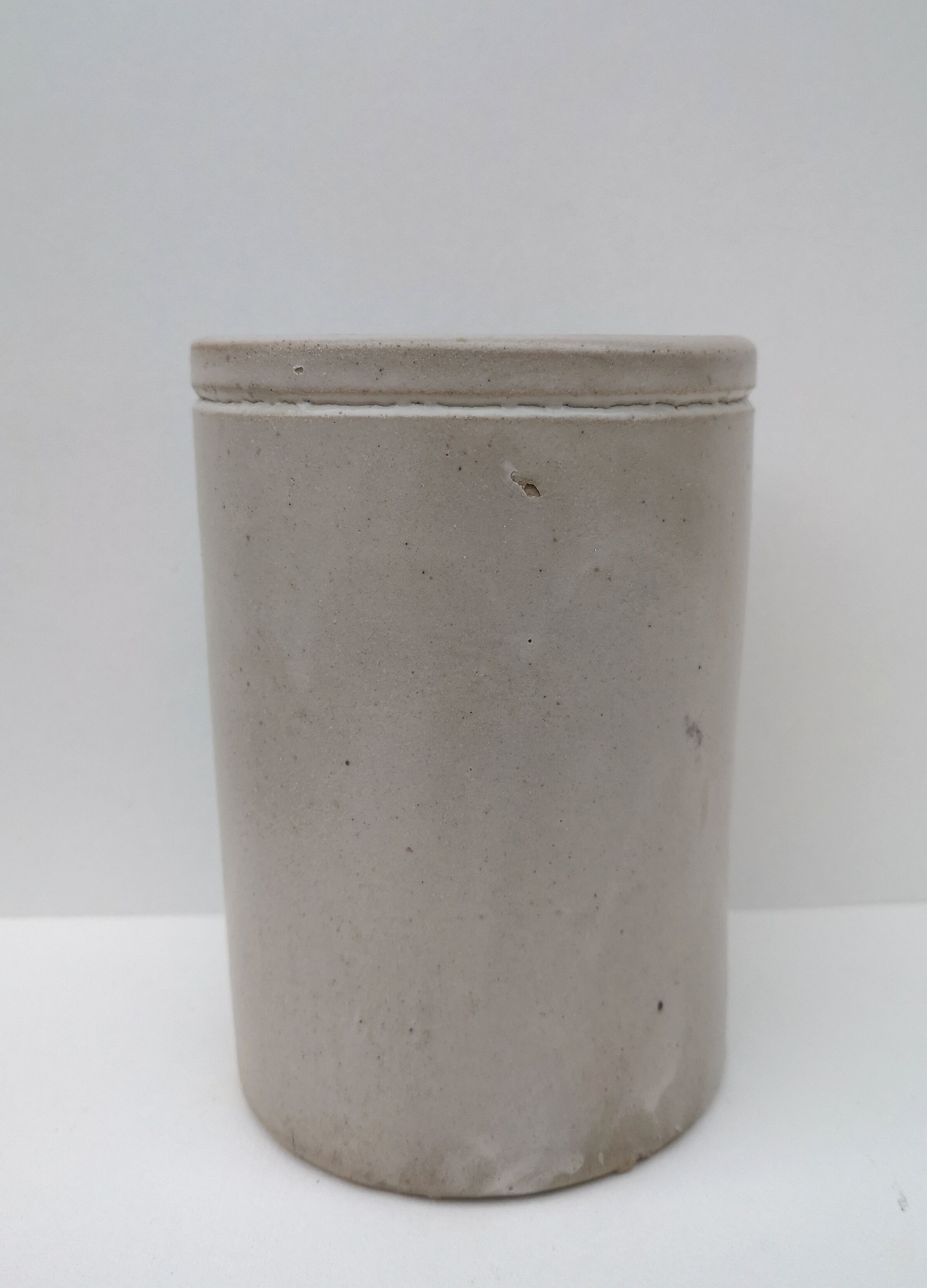 Old pot in glazed stoneware
